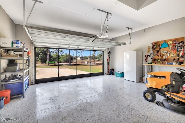 7824 7th Ter, Labelle, FL 33935 - garage featuring a garage door opener