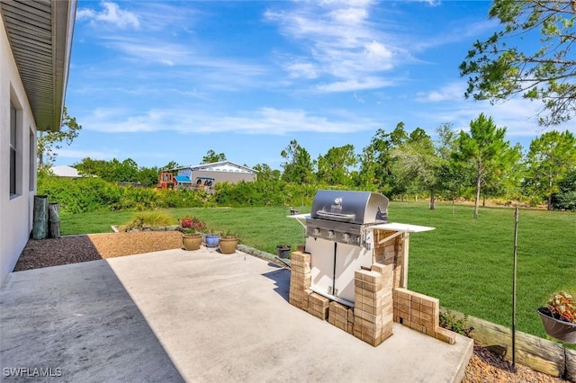 7824 7th Ter, Labelle, FL 33935 - view of patio featuring grilling area