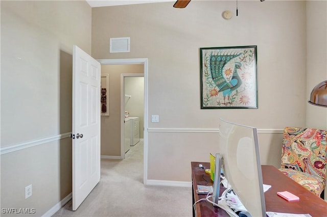 9820 Healthpark Cir Unit 101, Fort Myers, FL 33908 - office area featuring light colored carpet, a ceiling fan, baseboards, and washer / dryer