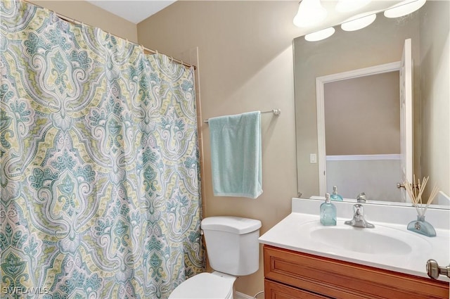 9820 Healthpark Cir Unit 101, Fort Myers, FL 33908 - full bathroom featuring vanity, toilet, and curtained shower