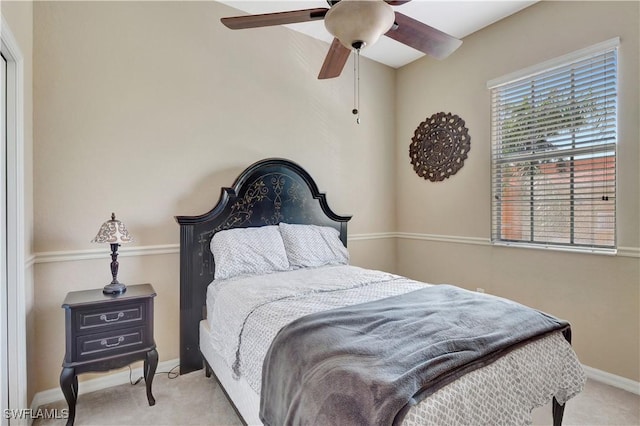 9820 Healthpark Cir Unit 101, Fort Myers, FL 33908 - carpeted bedroom with baseboards and ceiling fan