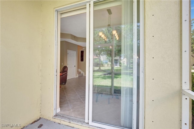 9820 Healthpark Cir Unit 101, Fort Myers, FL 33908 - doorway to property featuring stucco siding