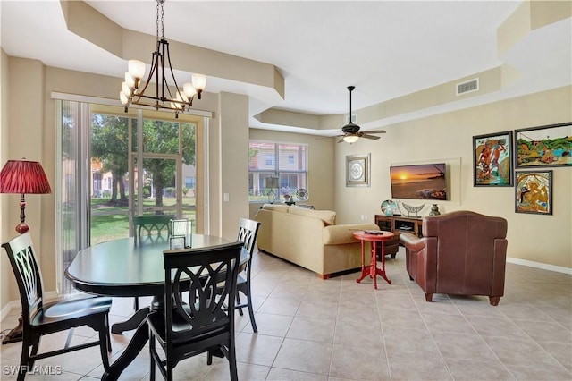 9820 Healthpark Cir Unit 101, Fort Myers, FL 33908 - dining area with light tile patterned flooring, plenty of natural light, baseboards, and a raised ceiling