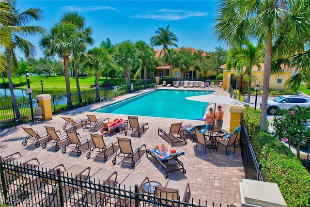 9820 Healthpark Cir Unit 101, Fort Myers, FL 33908 - community pool with a patio and a water view