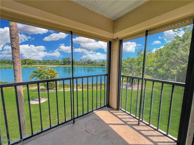 13264 White Marsh Ln Unit 3318, Fort Myers, FL 33912 - unfurnished sunroom featuring a water view and view of wooded area