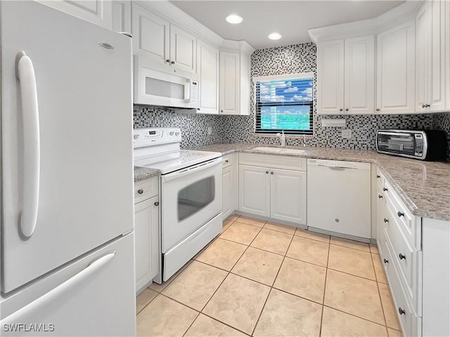 13264 White Marsh Ln Unit 3318, Fort Myers, FL 33912 - kitchen featuring white appliances, a sink, white cabinetry, tasteful backsplash, and recessed lighting