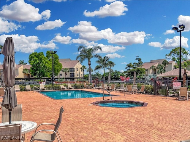 13264 White Marsh Ln Unit 3318, Fort Myers, FL 33912 - community pool with a community hot tub and a patio area