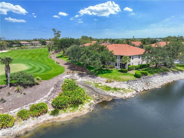 view from above of property featuring a nearby body of water and a golf club