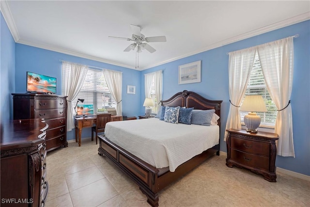 bedroom featuring crown molding, a ceiling fan, and baseboards