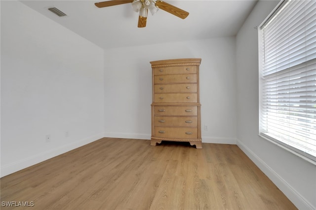 18298 Hepatica Rd, Fort Myers, FL 33967 - empty room with ceiling fan, light wood-style floors, and baseboards