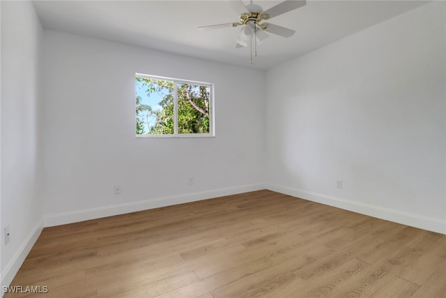 18298 Hepatica Rd, Fort Myers, FL 33967 - empty room featuring light wood finished floors, baseboards, and a ceiling fan