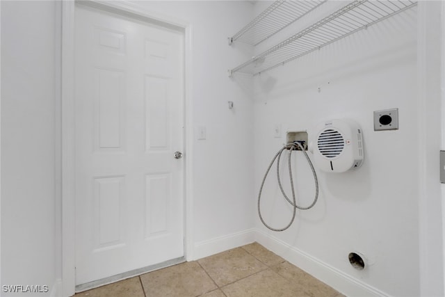 18298 Hepatica Rd, Fort Myers, FL 33967 - laundry room with hookup for a washing machine, hookup for an electric dryer, baseboards, and light tile patterned flooring