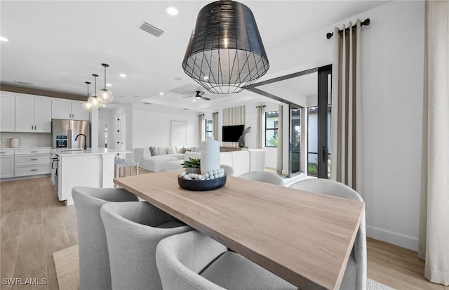12429 Basalt Ln, Alva, FL 33982 - dining room with light wood-style flooring, recessed lighting, baseboards, and a ceiling fan