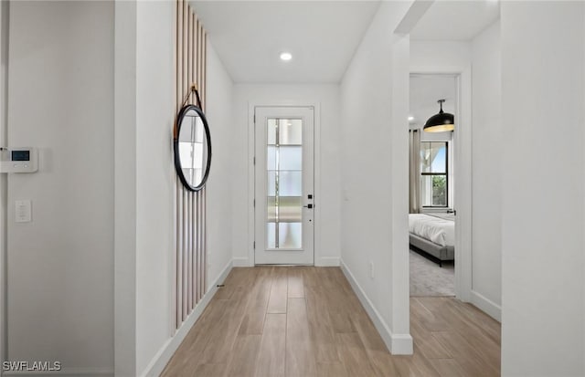 12429 Basalt Ln, Alva, FL 33982 - entryway with light wood finished floors, baseboards, and recessed lighting
