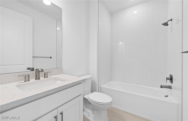 12429 Basalt Ln, Alva, FL 33982 - full bathroom featuring vanity, wood finished floors, and shower / washtub combination