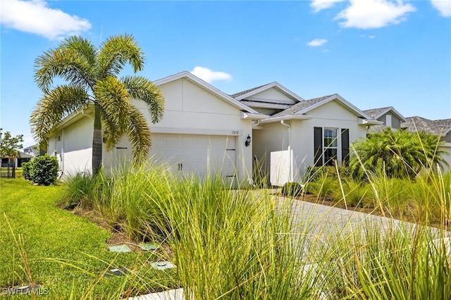 17672 Silverspur Dr, Punta Gorda, FL 33982 - single story home with stucco siding and an attached garage
