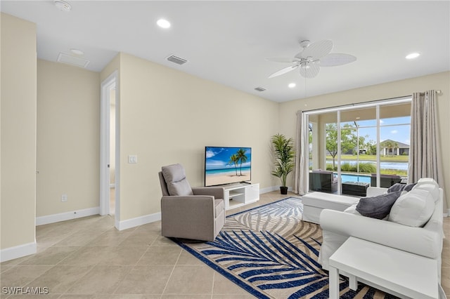 17672 Silverspur Dr, Punta Gorda, FL 33982 - living area featuring a ceiling fan, recessed lighting, and light tile patterned floors