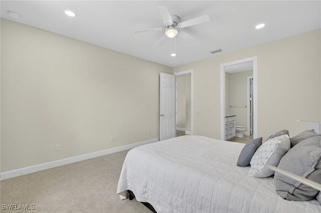 17672 Silverspur Dr, Punta Gorda, FL 33982 - bedroom featuring light carpet, recessed lighting, connected bathroom, and a ceiling fan