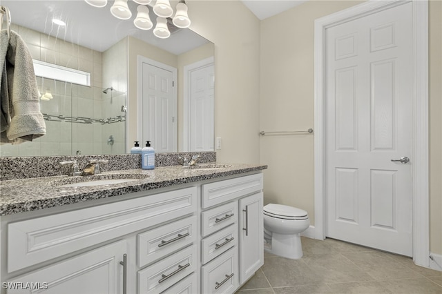 17672 Silverspur Dr, Punta Gorda, FL 33982 - bathroom featuring double vanity, a stall shower, and tile patterned floors