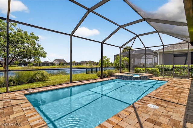 17672 Silverspur Dr, Punta Gorda, FL 33982 - view of swimming pool featuring a water view, a pool with connected hot tub, a patio area, and glass enclosure