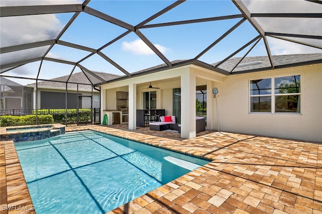 17672 Silverspur Dr, Punta Gorda, FL 33982 - view of pool with a patio, ceiling fan, a pool with connected hot tub, outdoor lounge area, and glass enclosure