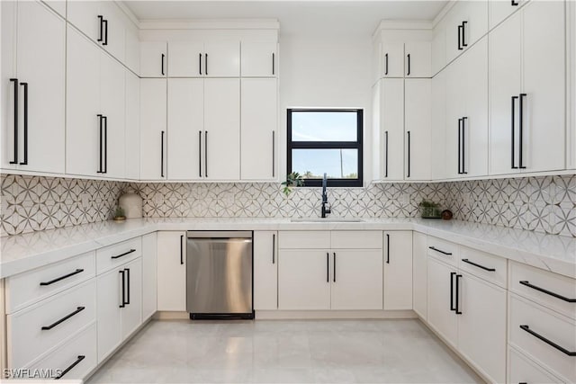 24131 Cock Robin Ln, Bonita Springs, FL 34135 - kitchen with stainless steel dishwasher, a sink, tasteful backsplash, and white cabinets