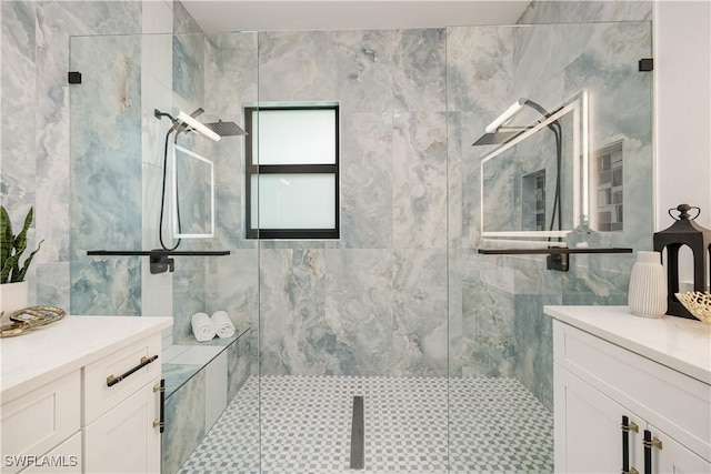 24131 Cock Robin Ln, Bonita Springs, FL 34135 - bathroom featuring a marble finish shower, tile walls, and vanity