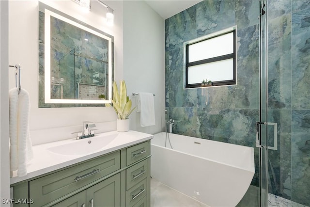 24131 Cock Robin Ln, Bonita Springs, FL 34135 - bathroom with a freestanding tub, vanity, and a shower stall