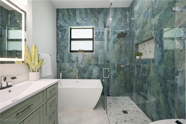 24131 Cock Robin Ln, Bonita Springs, FL 34135 - bathroom with vanity, a marble finish shower, and a freestanding bath