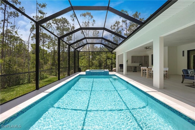 24131 Cock Robin Ln, Bonita Springs, FL 34135 - view of pool featuring a patio area, ceiling fan, a pool with connected hot tub, and glass enclosure