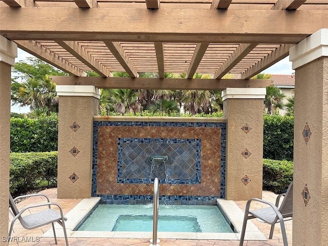view of pool featuring a hot tub and a pergola