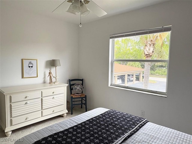 carpeted bedroom featuring a ceiling fan