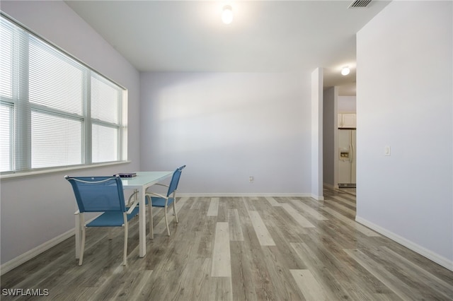 1083 Pollywog Dr, Labelle, FL 33935 - dining area featuring light wood-style flooring and baseboards