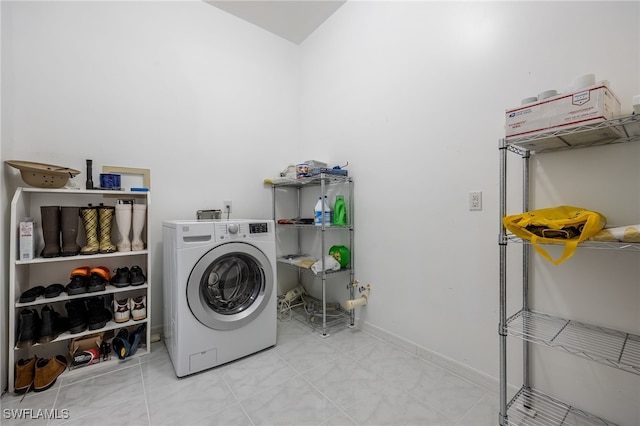 1083 Pollywog Dr, Labelle, FL 33935 - laundry room featuring washer / clothes dryer and baseboards