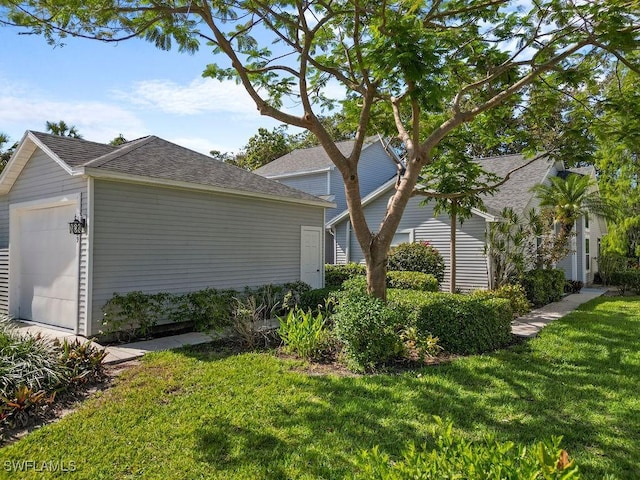 1429 Monarch Cir, Naples, FL 34116 - view of side of property with a lawn, a shingled roof, and an outdoor structure