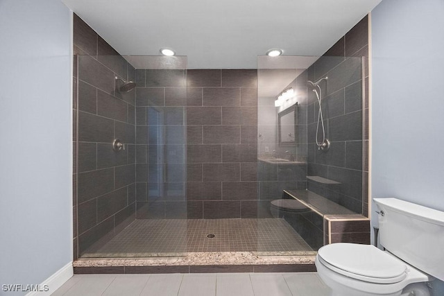 1429 Monarch Cir, Naples, FL 34116 - bathroom featuring toilet, a tile shower, tile patterned floors, and recessed lighting