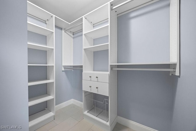 1429 Monarch Cir, Naples, FL 34116 - spacious closet with light tile patterned floors
