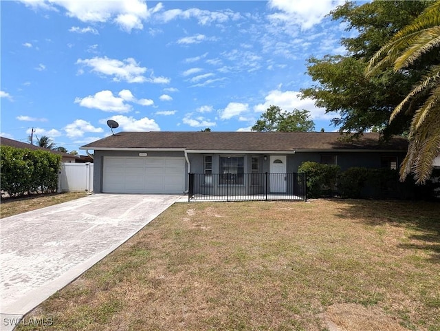 ranch-style home with a garage, stucco siding, and driveway