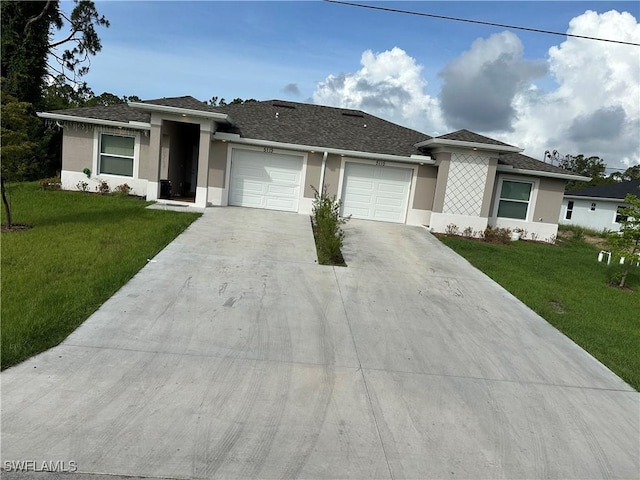 5115 30th St SW, Lehigh Acres, FL 33973 - view of front of home with a garage, stucco siding, concrete driveway, and a front yard