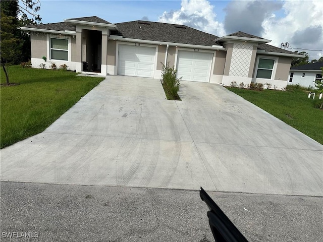 5115 30th St SW, Lehigh Acres, FL 33973 - view of front of home with an attached garage, driveway, stucco siding, a front lawn, and a shingled roof