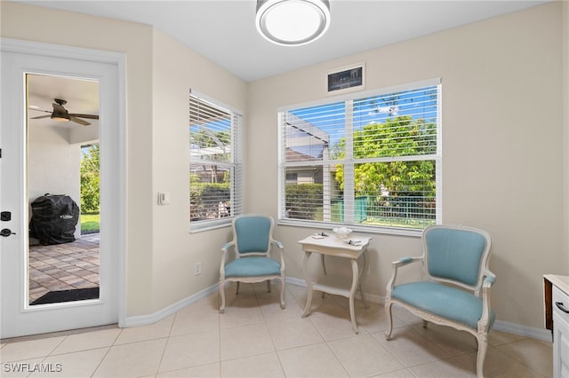 3932 Ruxton Rd, Naples, FL 34116 - sitting room featuring baseboards, ceiling fan, and light tile patterned floors