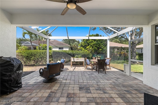 3932 Ruxton Rd, Naples, FL 34116 - view of patio with outdoor dining space, ceiling fan, and a lanai