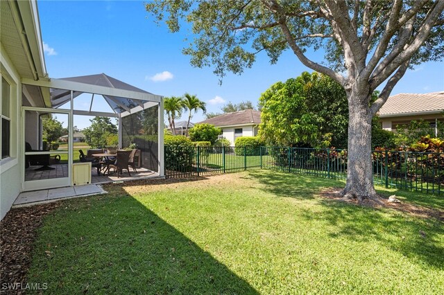 3932 Ruxton Rd, Naples, FL 34116 - view of yard featuring a patio and a lanai