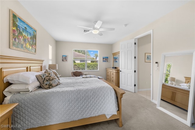 3932 Ruxton Rd, Naples, FL 34116 - bedroom with light carpet, baseboards, and ceiling fan
