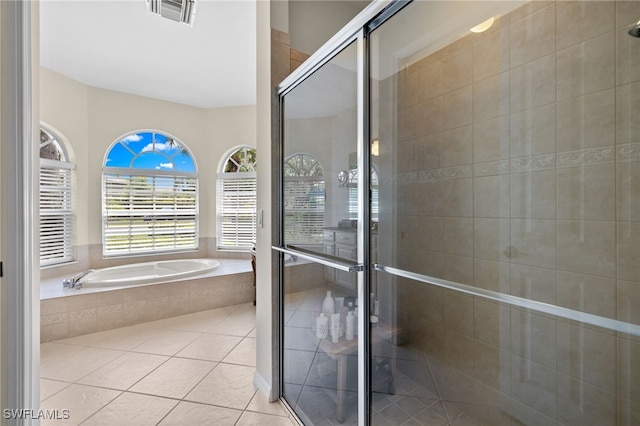 3932 Ruxton Rd, Naples, FL 34116 - bathroom with a garden tub, a stall shower, and tile patterned flooring