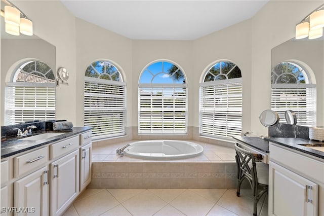 3932 Ruxton Rd, Naples, FL 34116 - full bathroom with vanity, a garden tub, and healthy amount of natural light