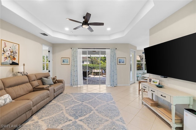 3932 Ruxton Rd, Naples, FL 34116 - living room with a tray ceiling, a ceiling fan, light tile patterned floors, baseboards, and recessed lighting