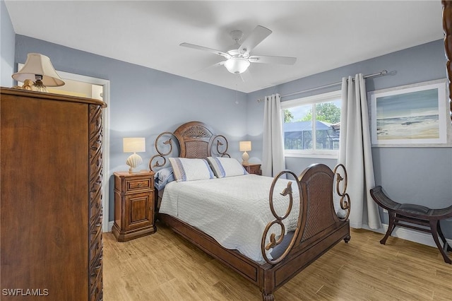 813 Saint Andrews Blvd, Naples, FL 34113 - bedroom with light wood-type flooring, baseboards, and ceiling fan