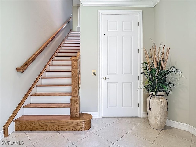 11256 Bienvenida Way Unit 6D, Fort Myers, FL 33908 - staircase with baseboards and tile patterned floors