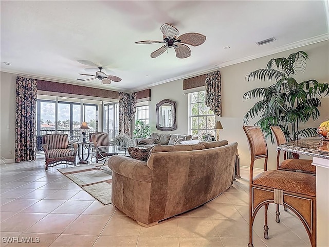 11256 Bienvenida Way Unit 6D, Fort Myers, FL 33908 - living area with crown molding, a ceiling fan, light tile patterned floors, and baseboards